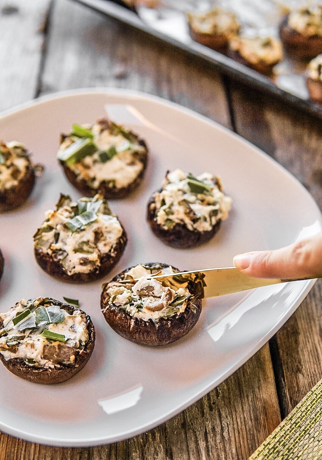 Funghi ripieni con ricotta e rucola