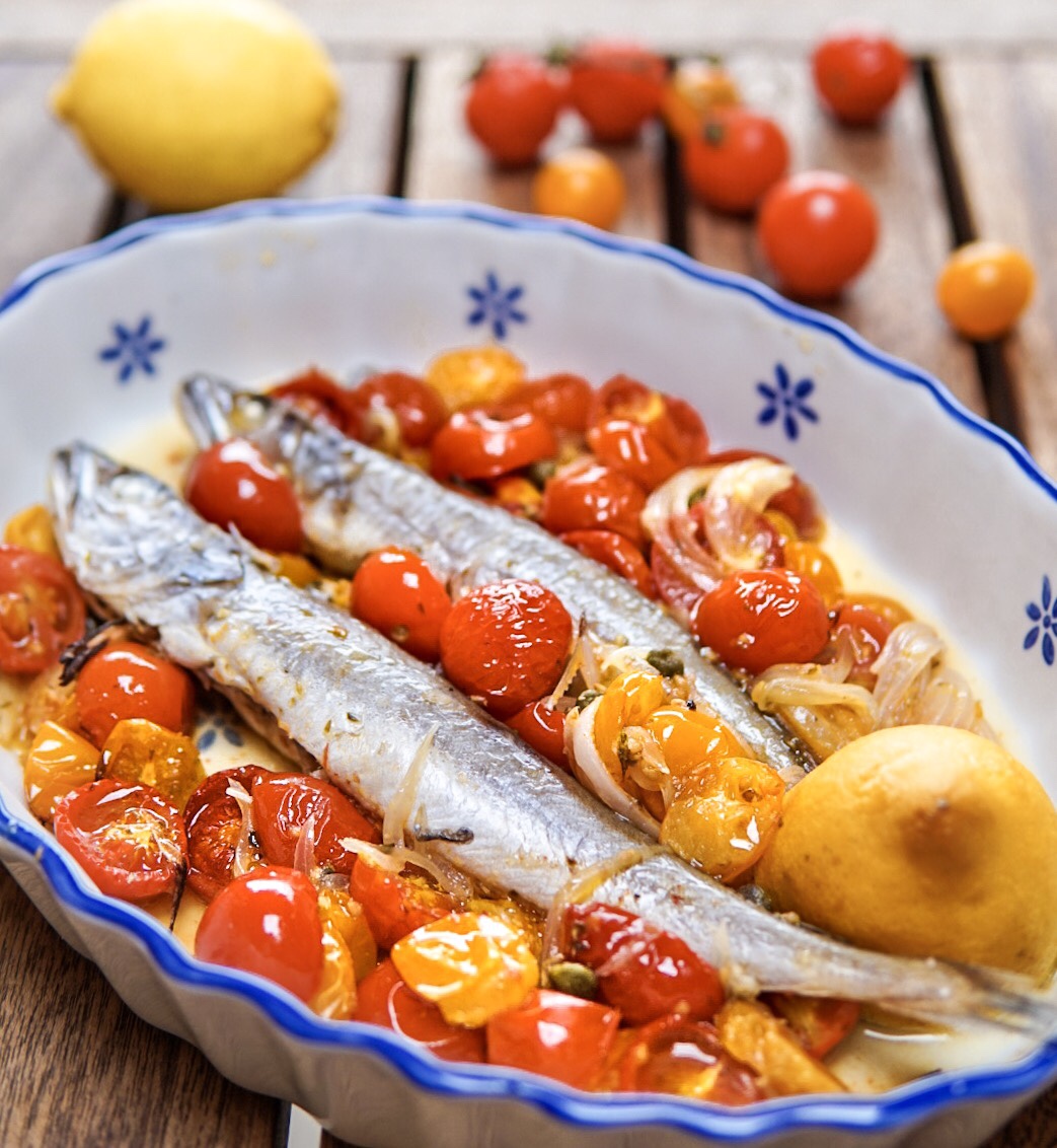 Merluzzetti al forno con pomodorini